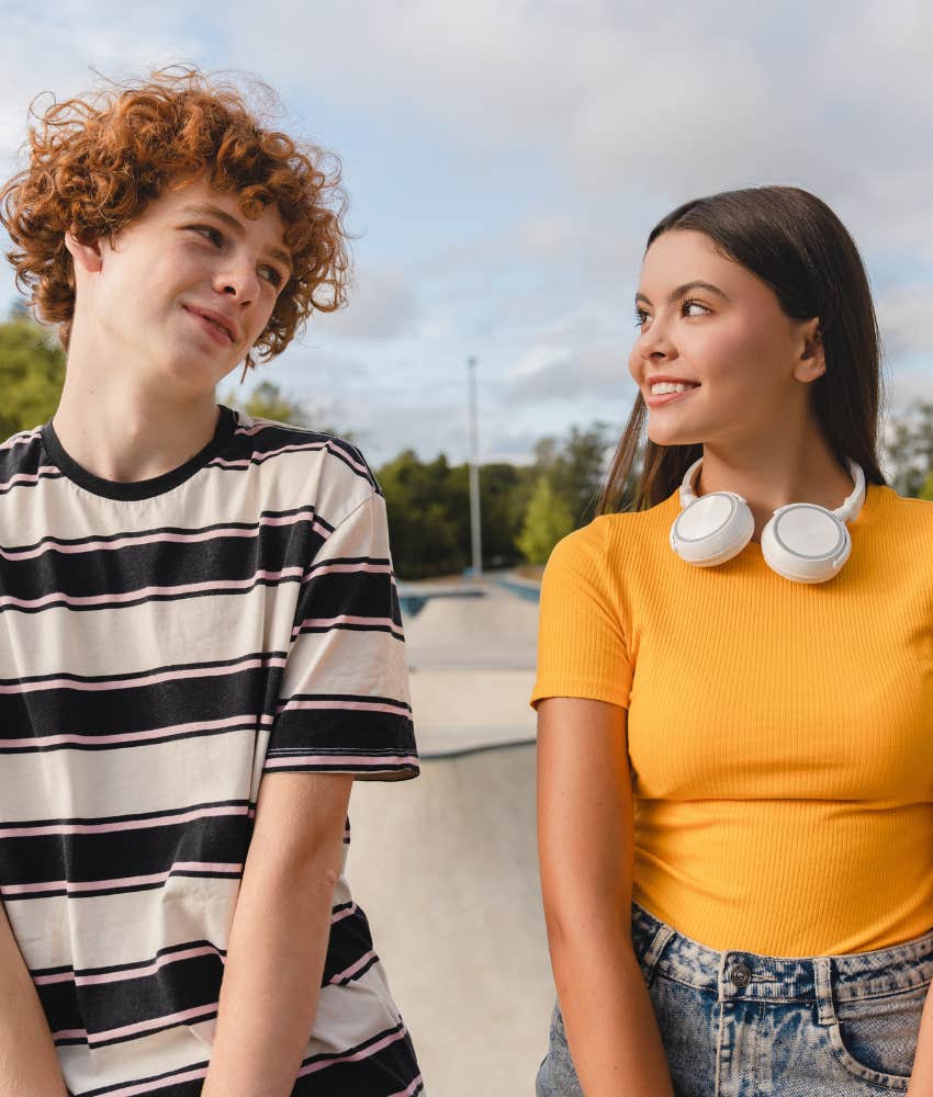 Best friends sit and smile showing boundaries