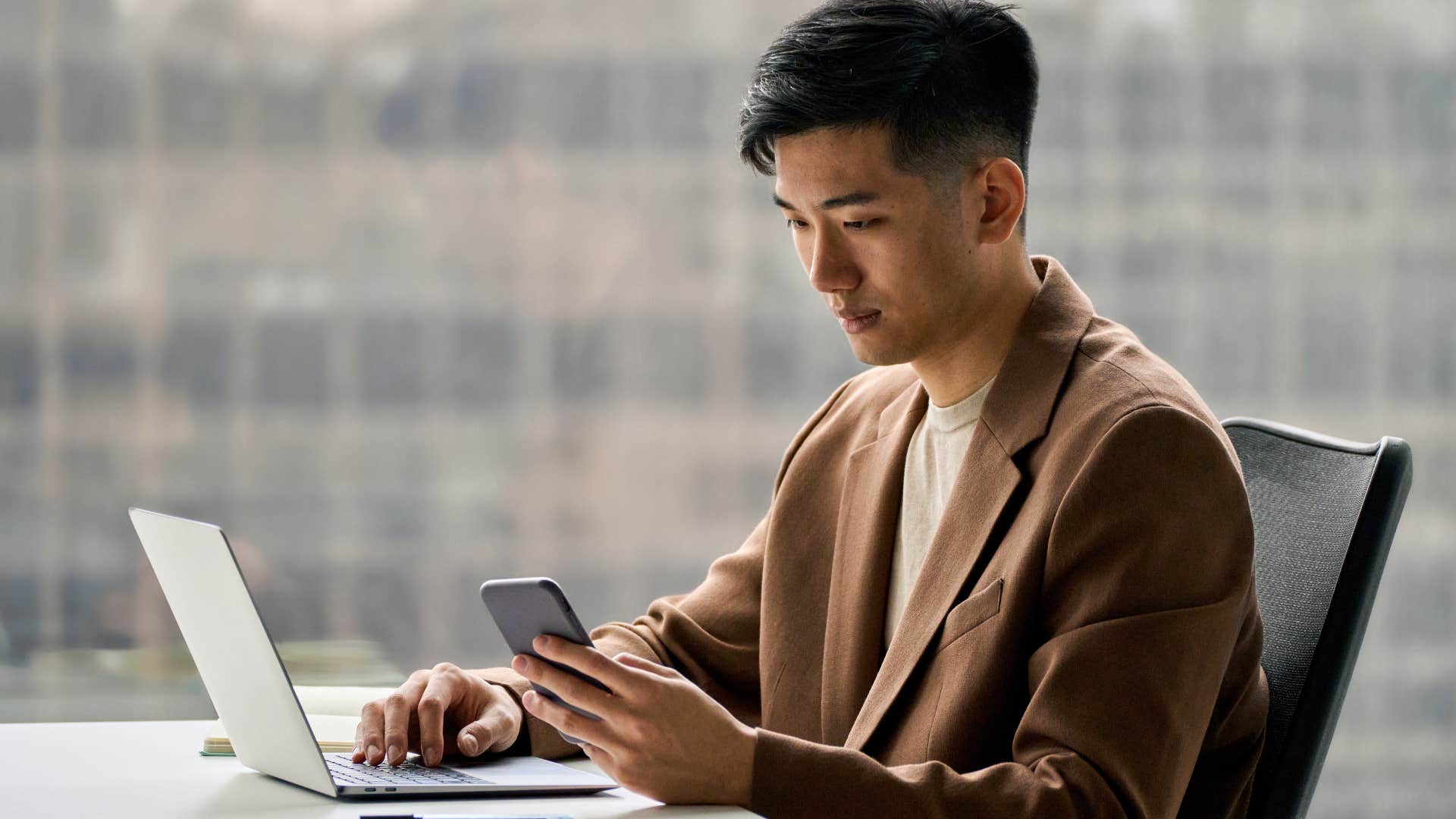 hyper-independent man working alone in an office