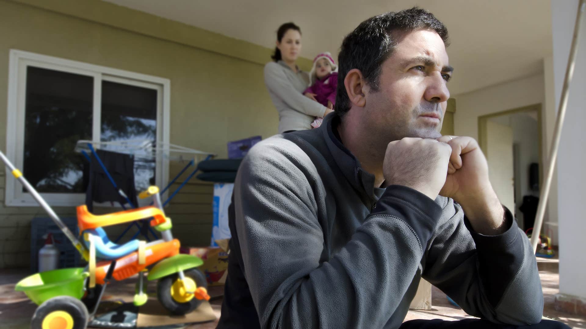 man worried about being selfish with his family