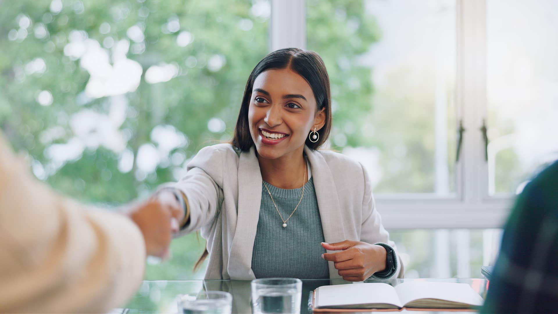 professional woman shaking hands and remembering names