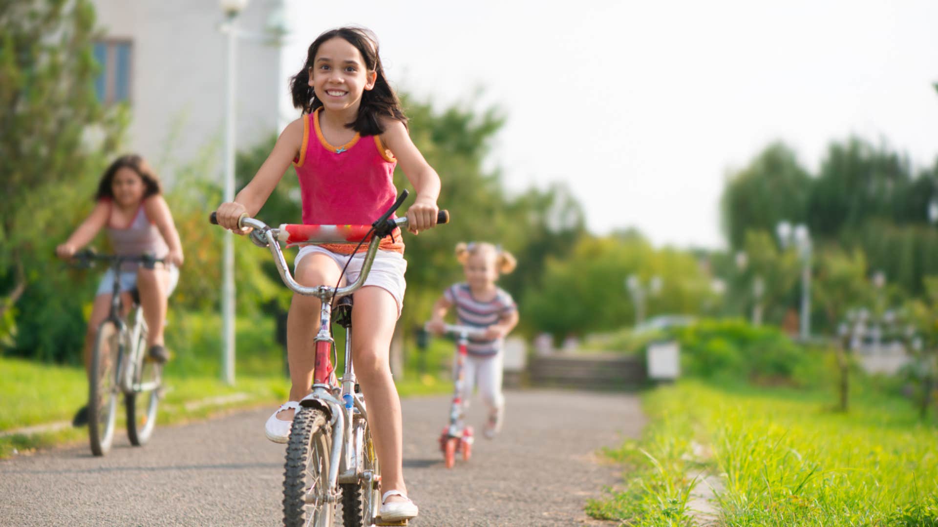 kids riding bicycles without helmets