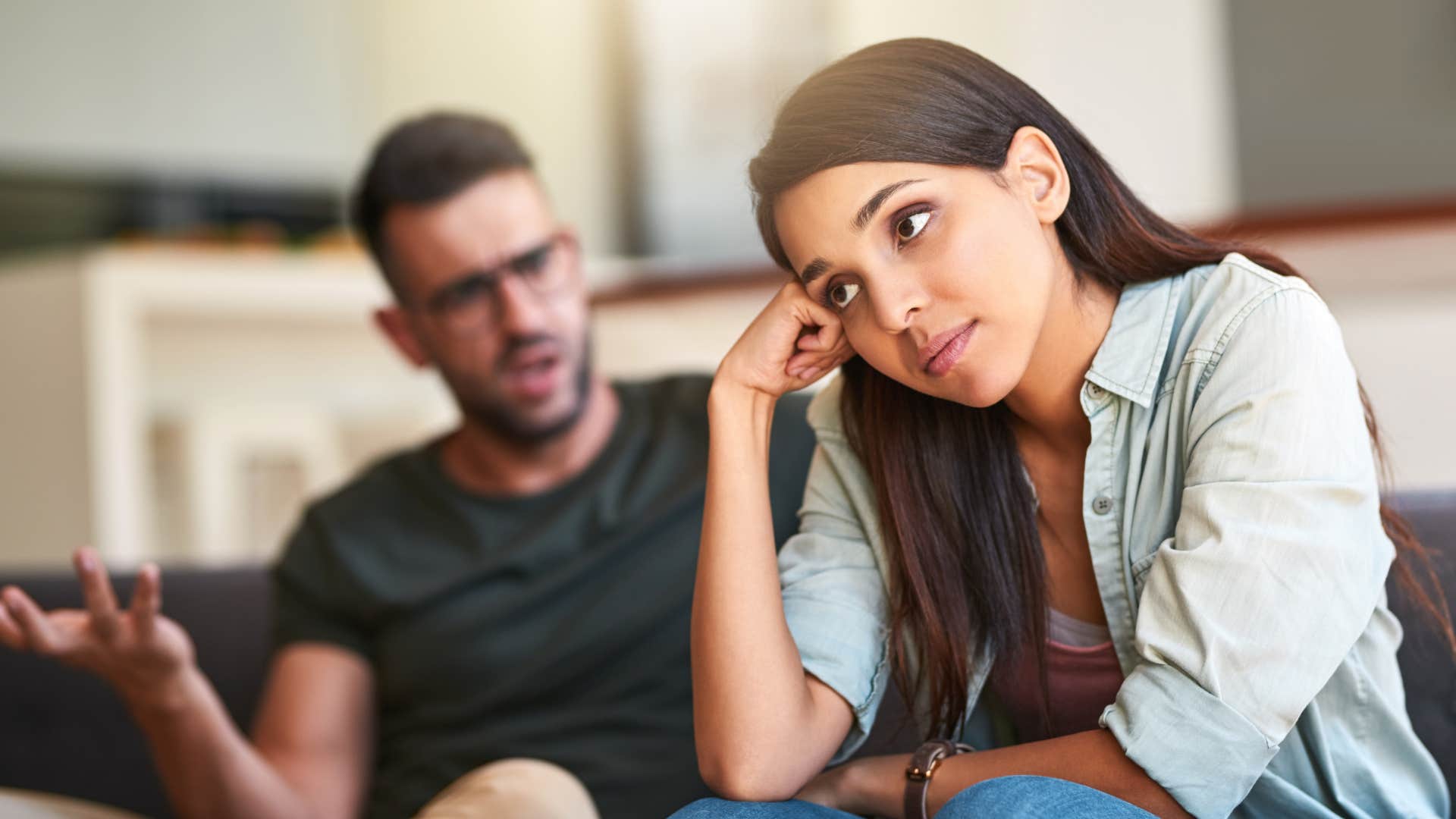Annoyed person listens to partner showing to stay firm in breakup