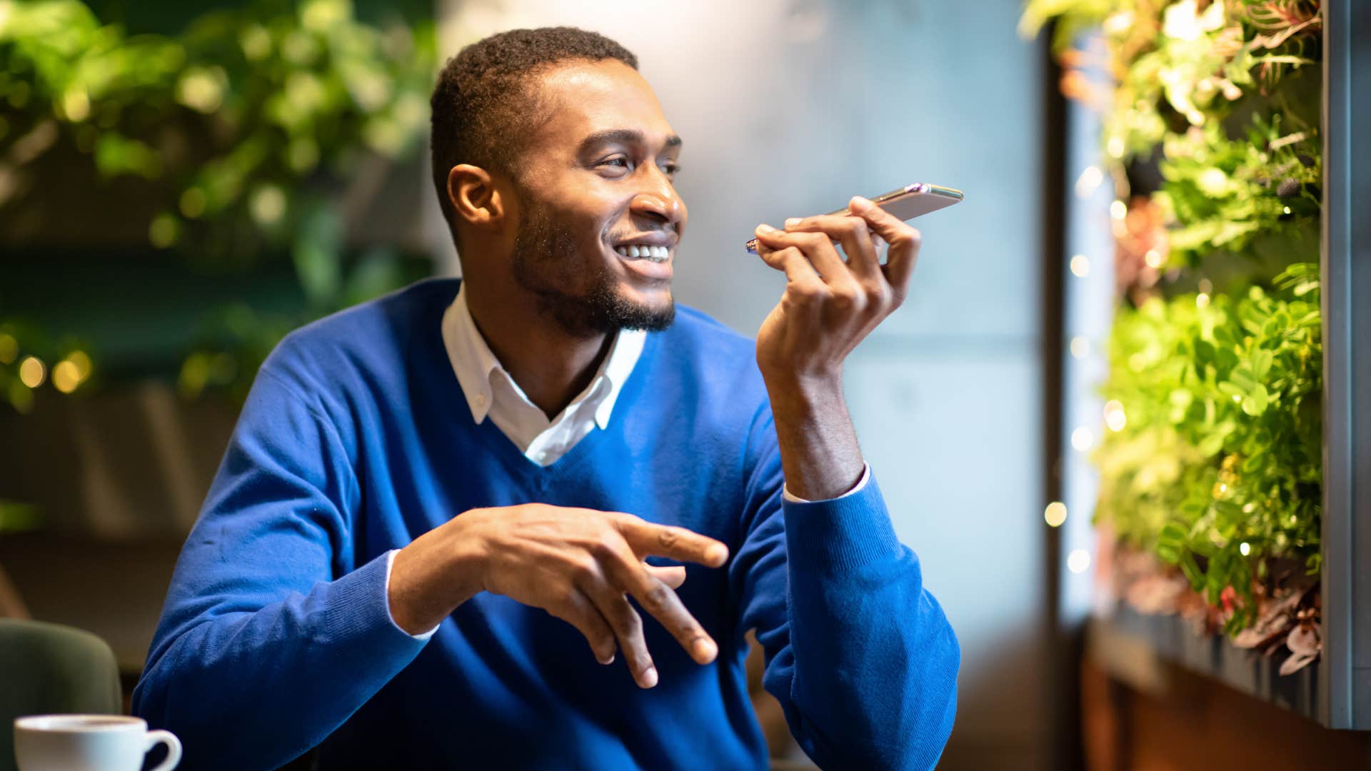 Relaxed man takes time to chat on phone showing chivalrous gesture