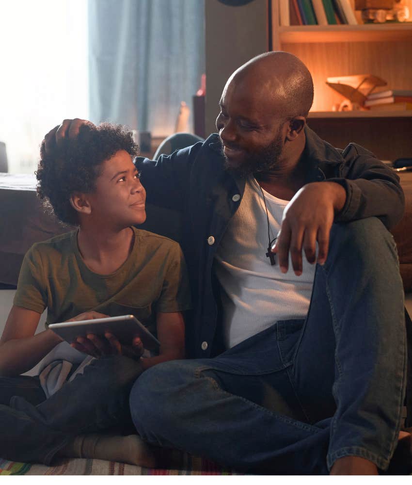 Caring parent listens to child 