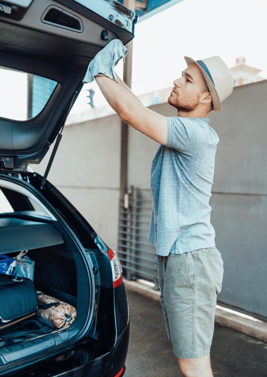 partner cleaning his spouses' car
