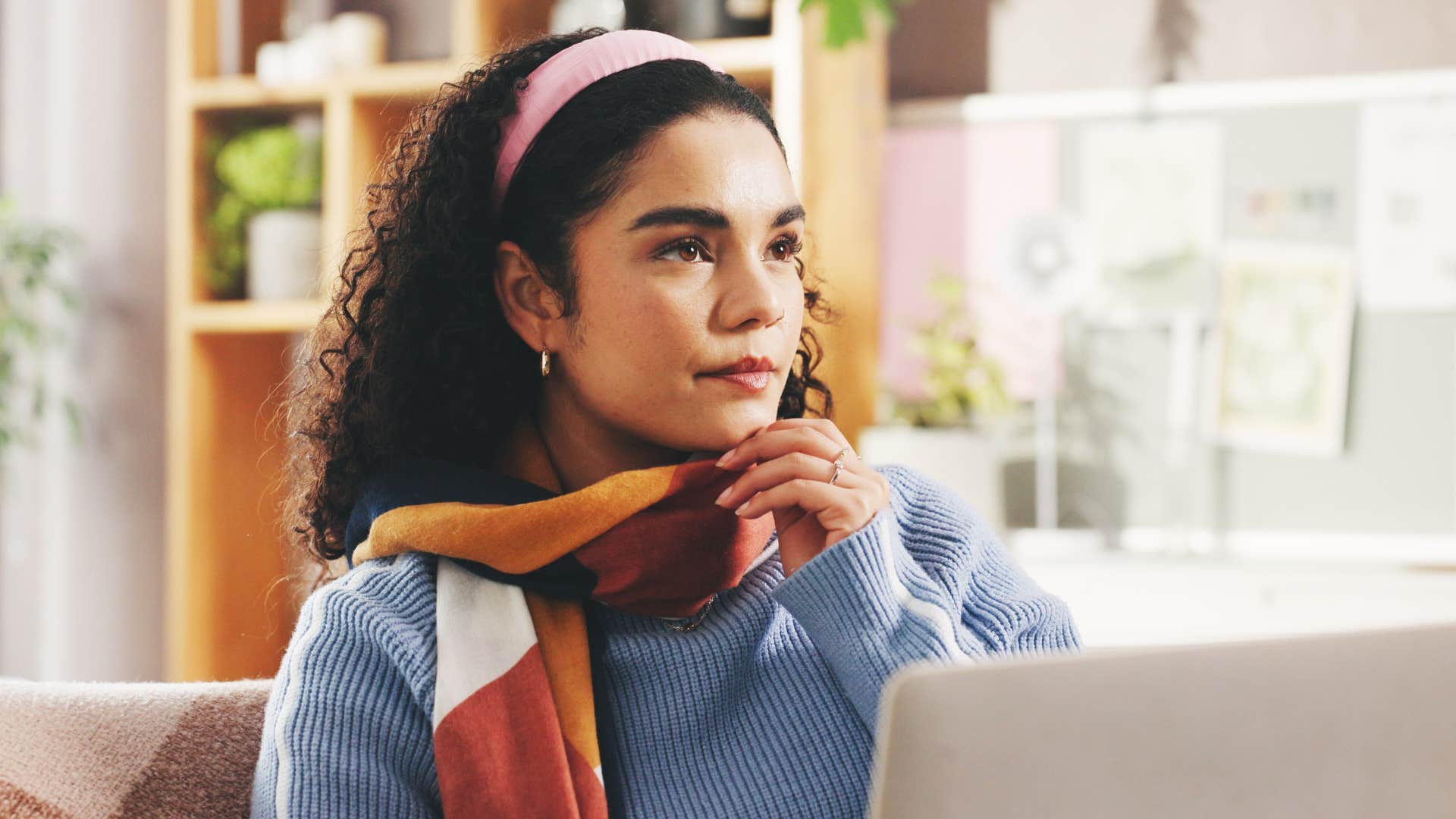 pensive woman problem-solving at work