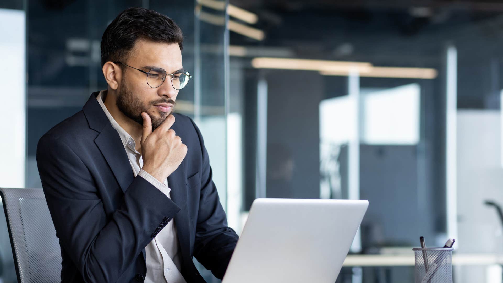 intelligent man at work filtering out unimportant information