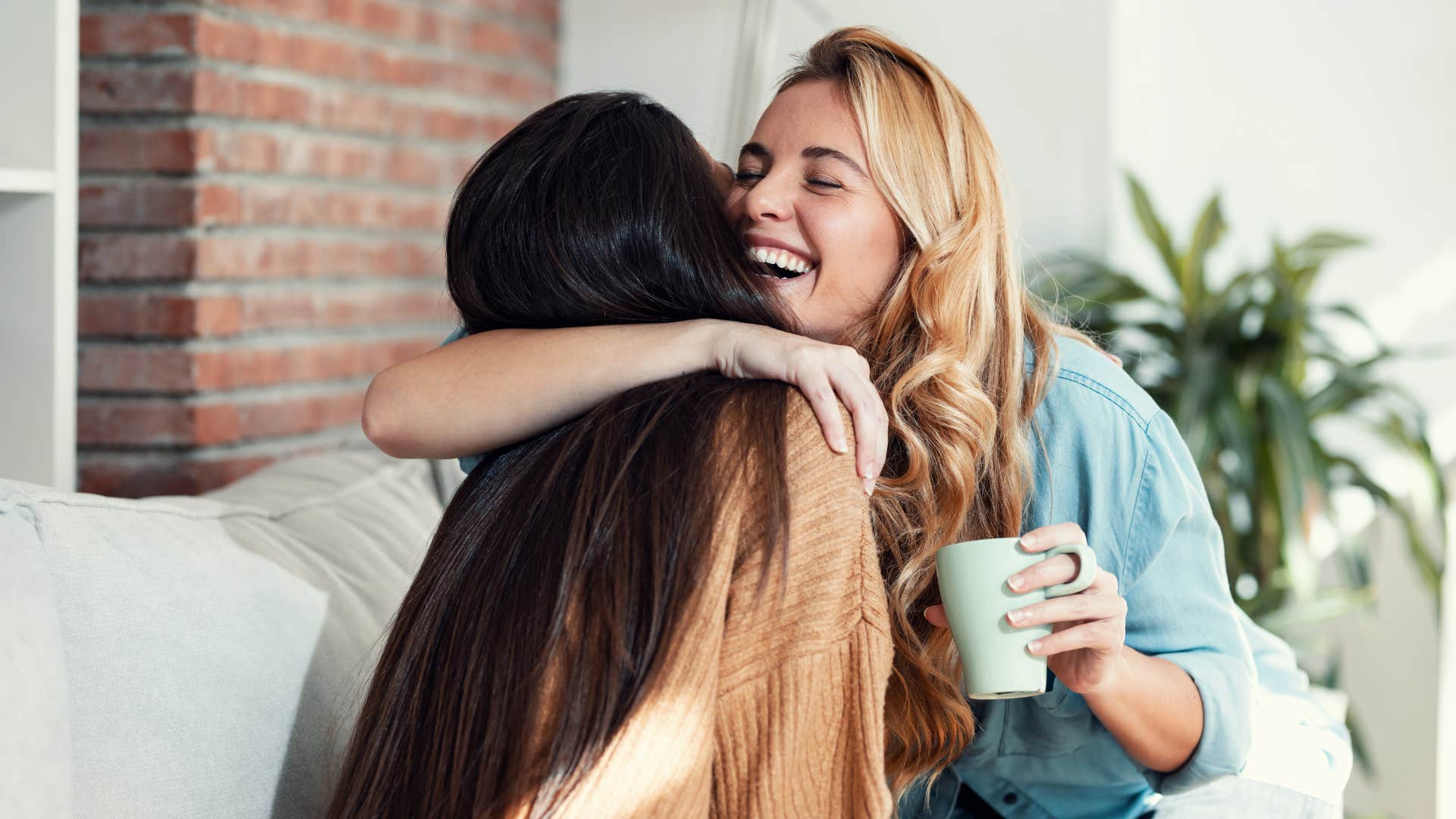 friends hugging focusing on the present moment together