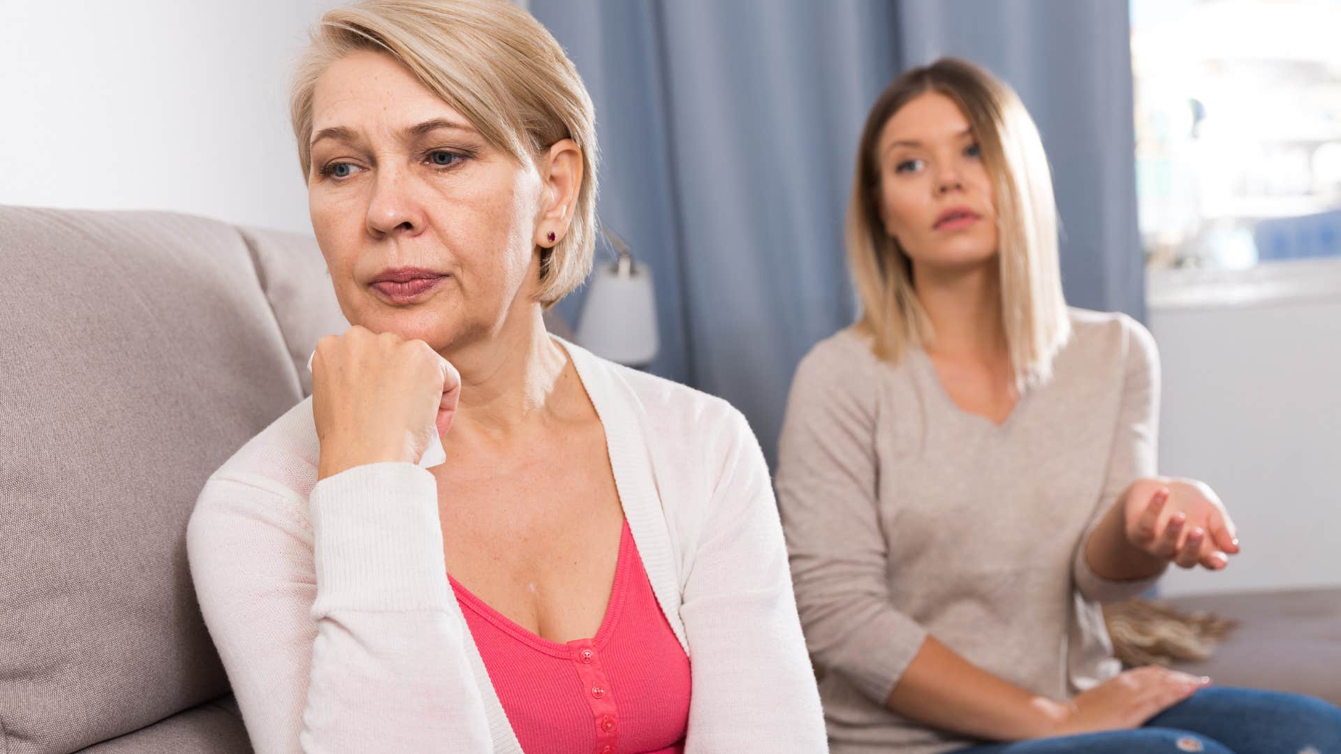 Emotional person ignored by parent showing nothing was ever good enough