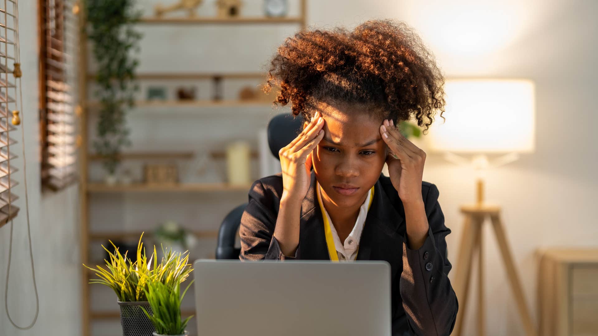 Stressed person touches forehead showing nothing was ever good enough