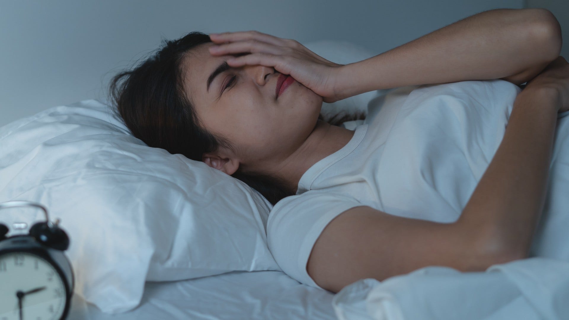 woman who struggles to turn brain off at night as she is sensitive to environmental shifts