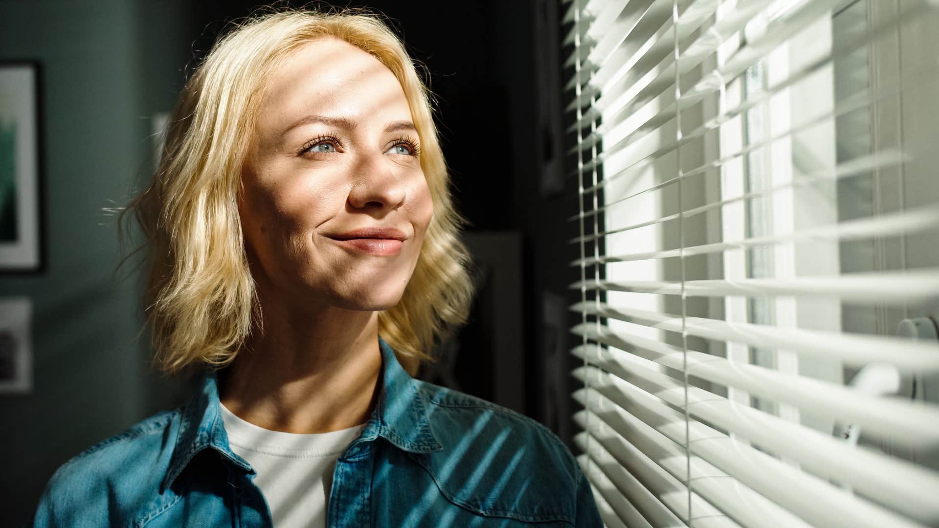 woman who respects privacy looking out the window