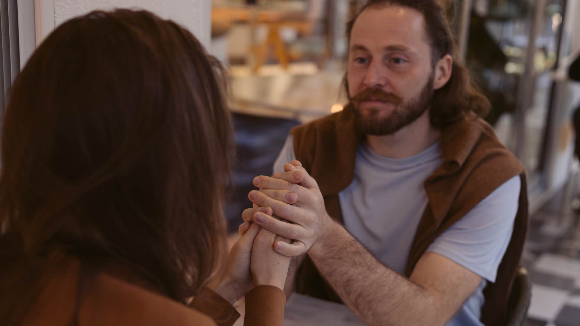 man who prioritizes quality over quantity having a deep conversation with partner