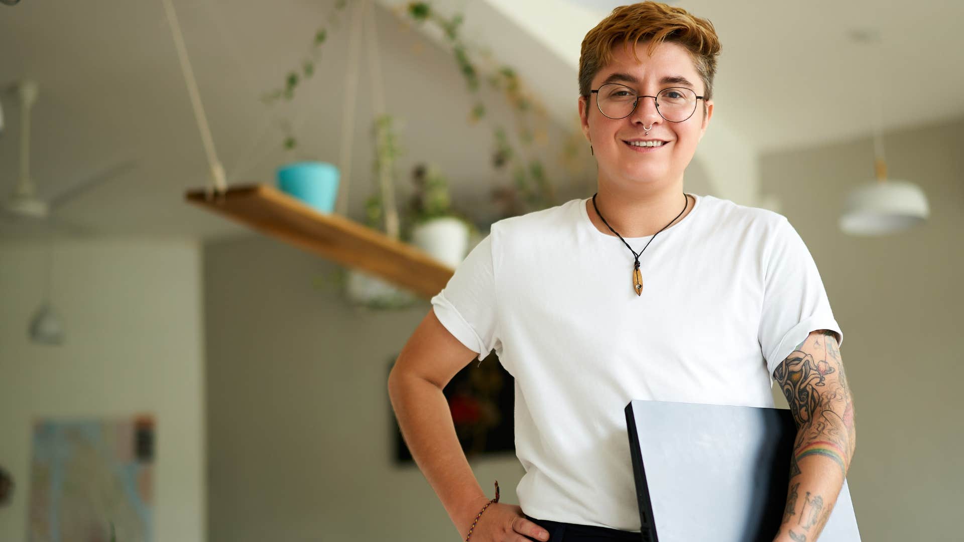 Person who's an advocate at heart smiling at work