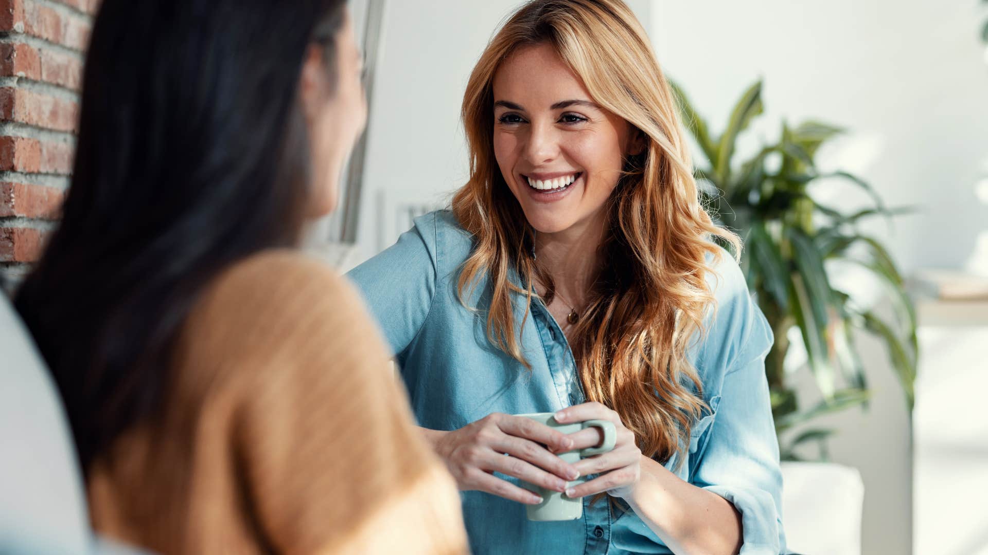 Woman who's consistent and reliable smiling with a friend