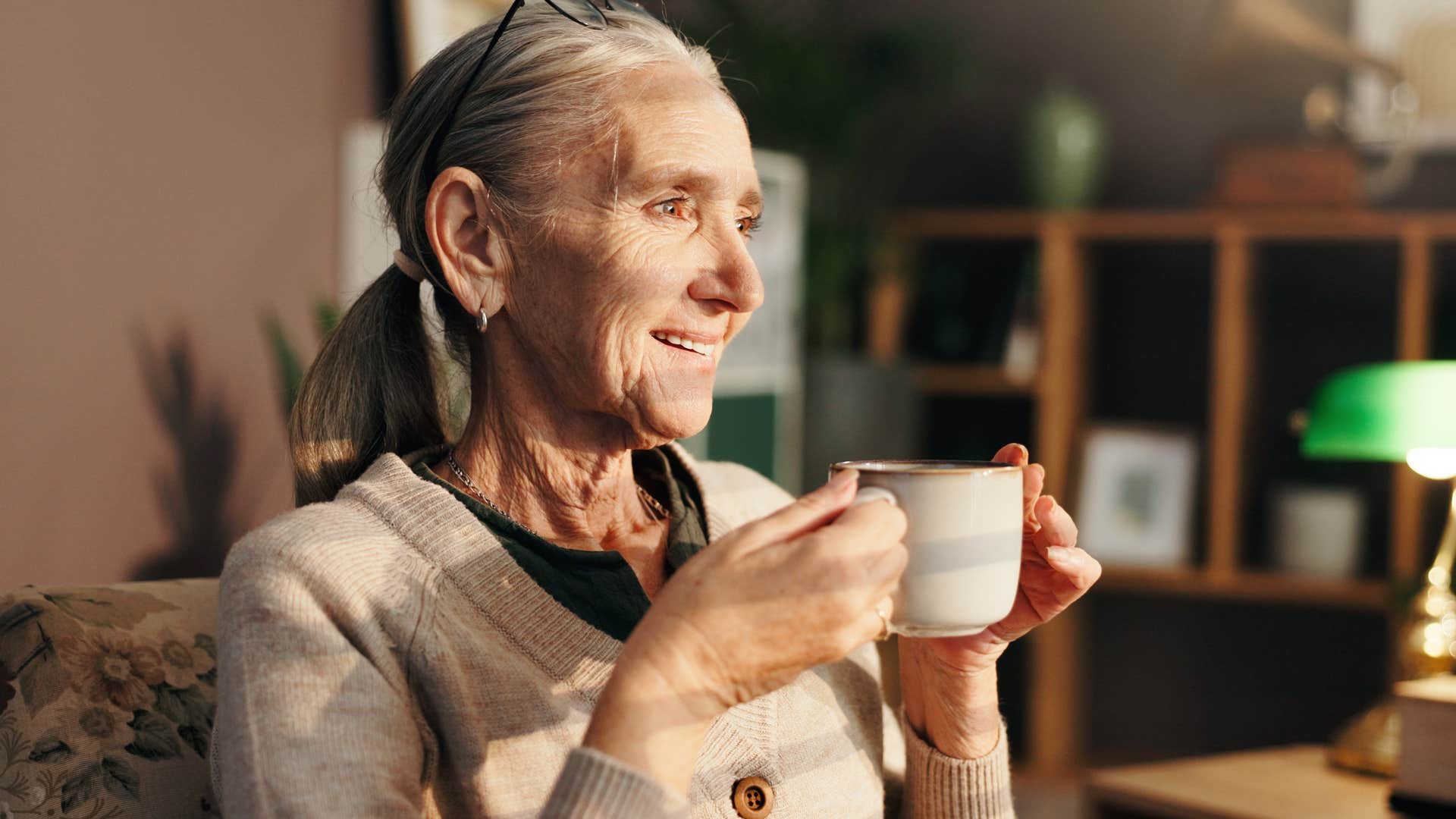 Woman who's a private person drinking coffee at home