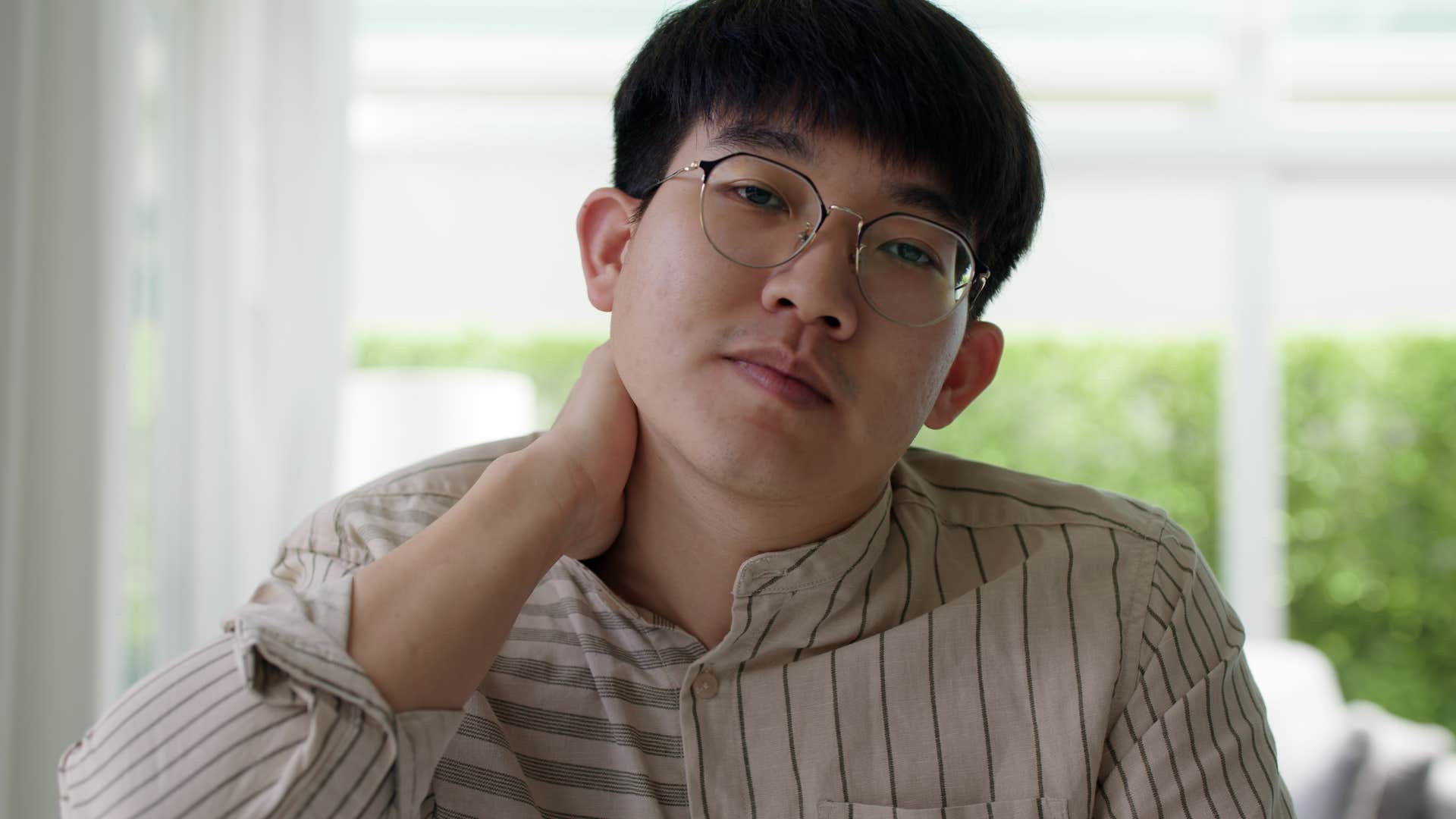 shy awkward man defensive due to insecurity or shame