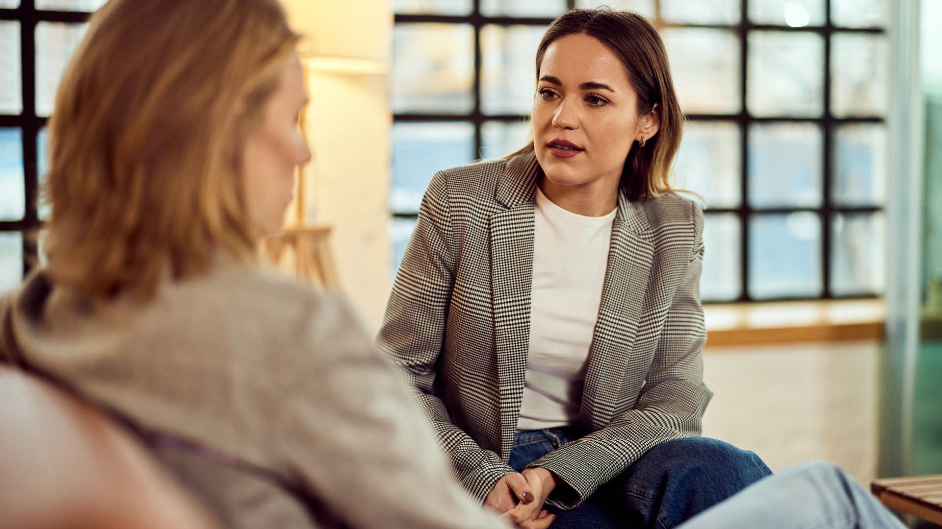woman overusing therapy language with a friend
