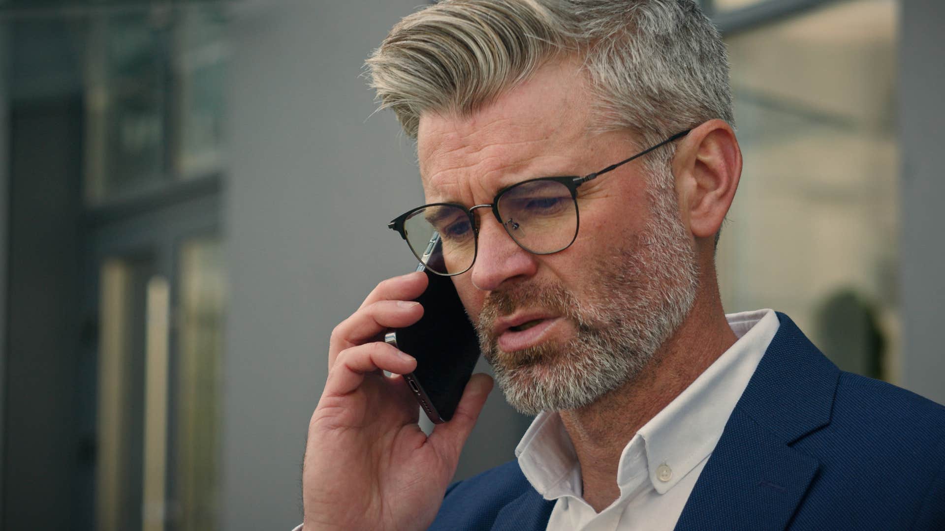 man on the phone using his busyness as an excuse