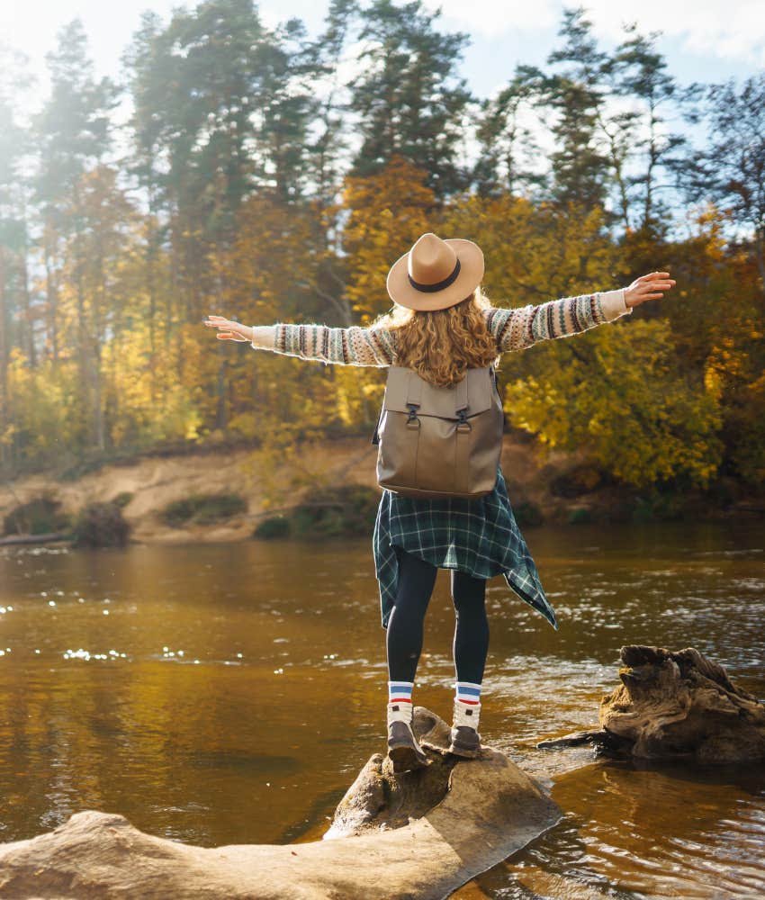 Passionate person hikes in nature showing way to be ok in messy world