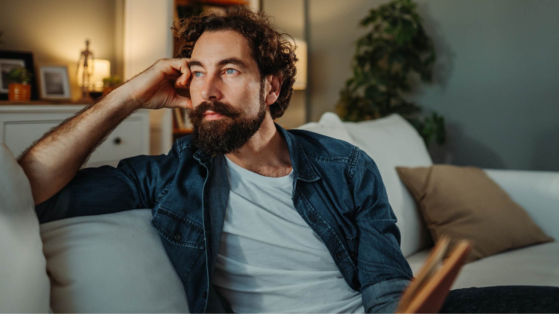 spiritually gifted man who trusts his gut thinking at home