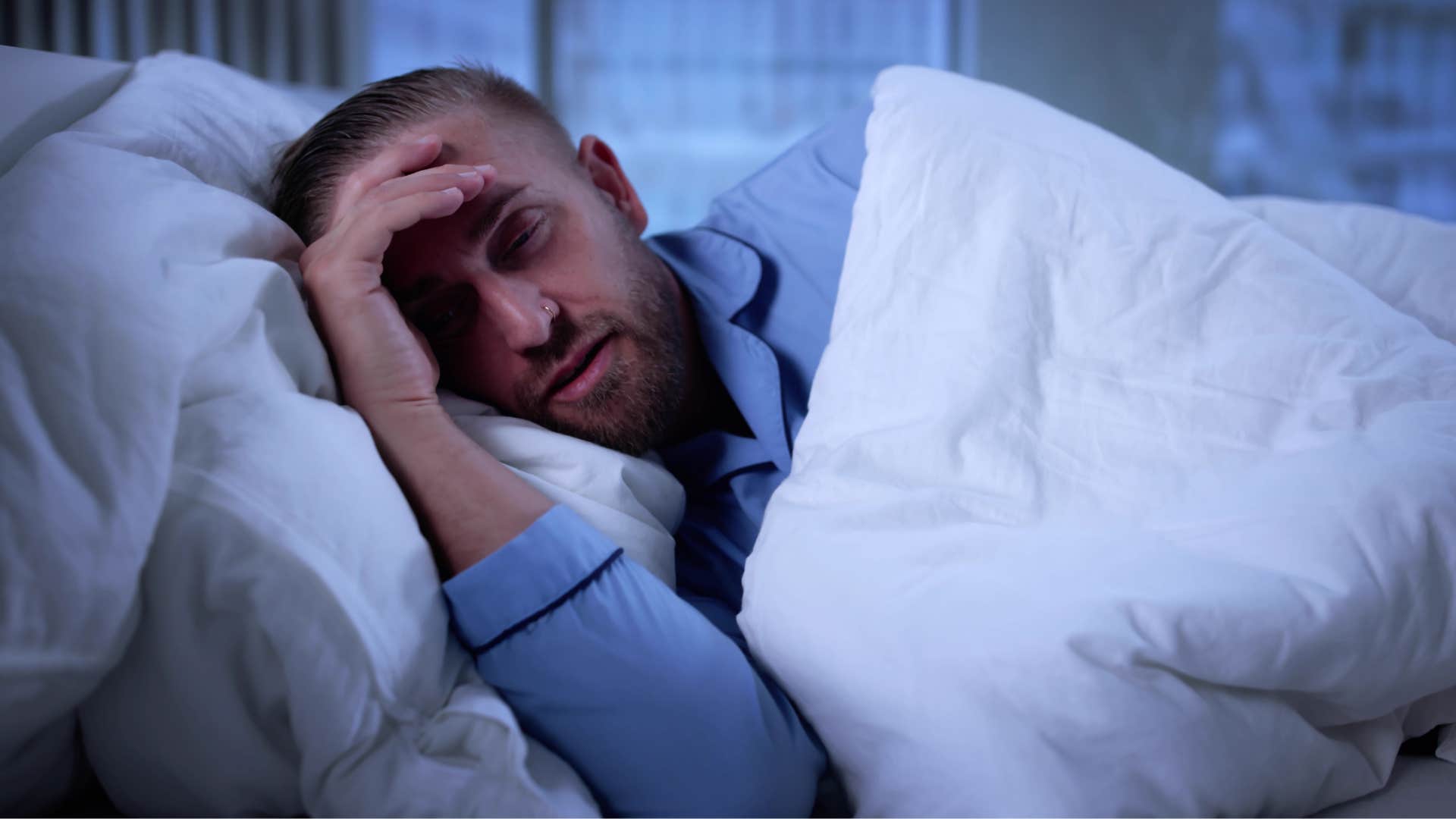 spiritually gifted man awakening from vivid dream