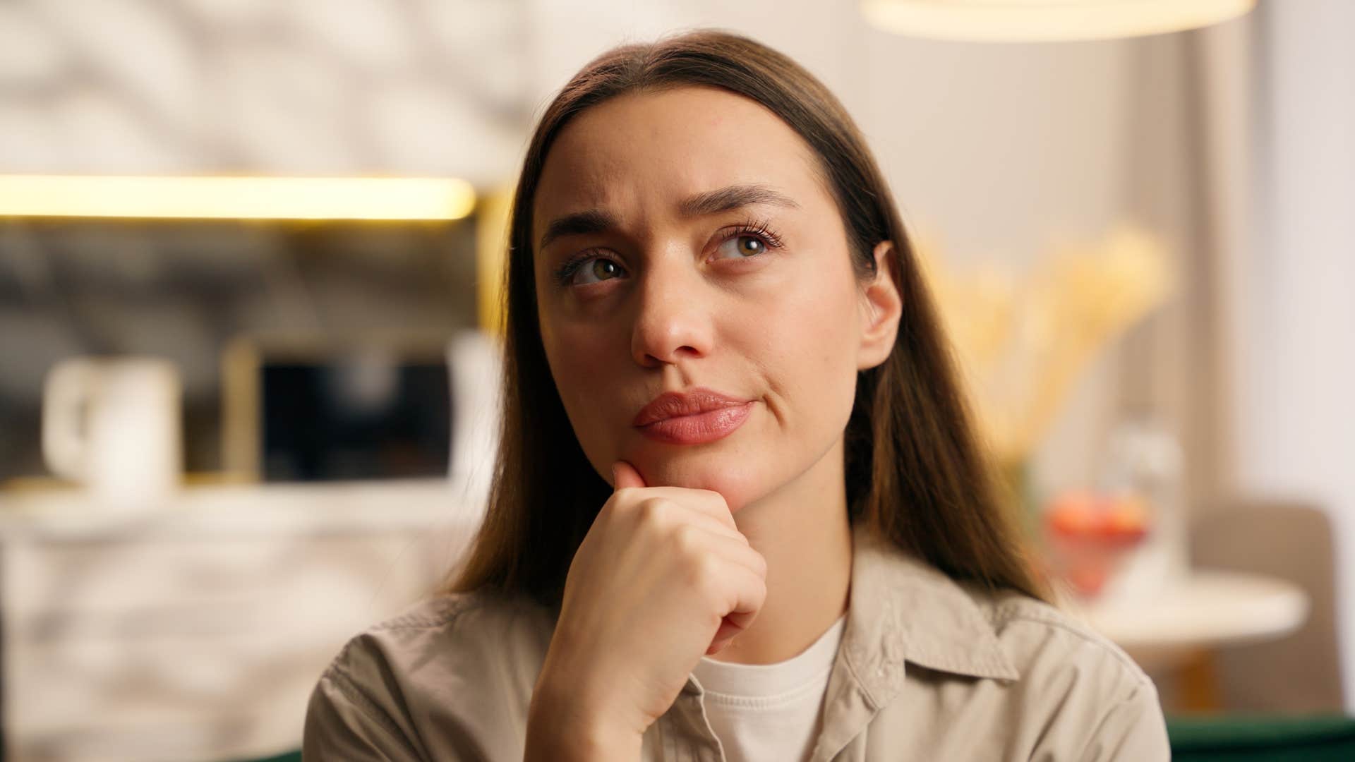 pensive woman who notices patterns