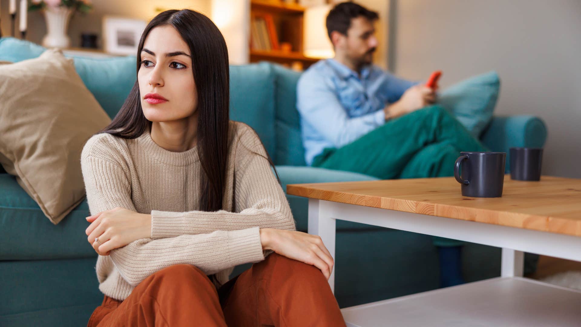 woman sitting in silence seeing how partner responds