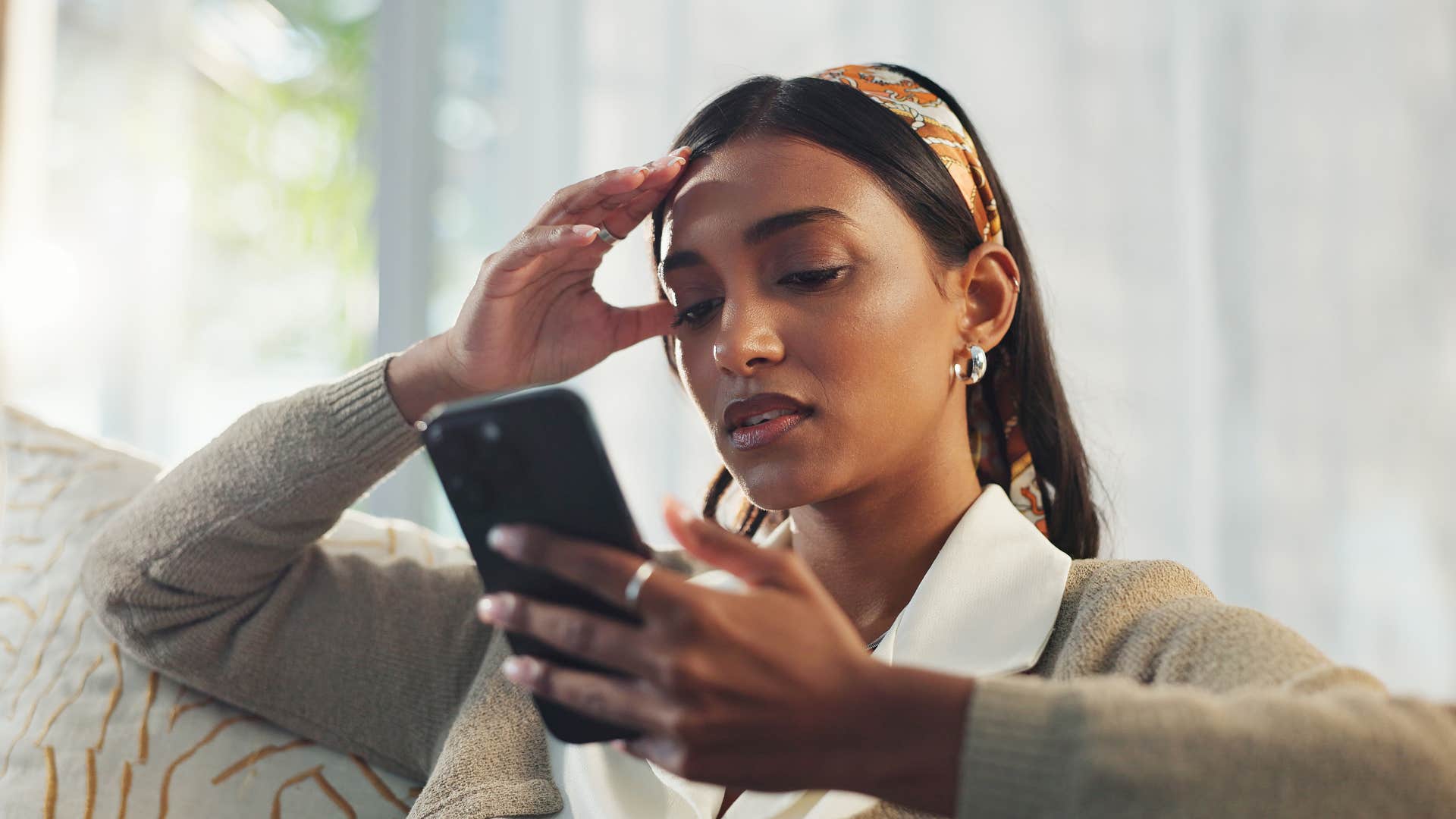 woman who doesn't fit in anywhere annoyed by inauthenticity in group text
