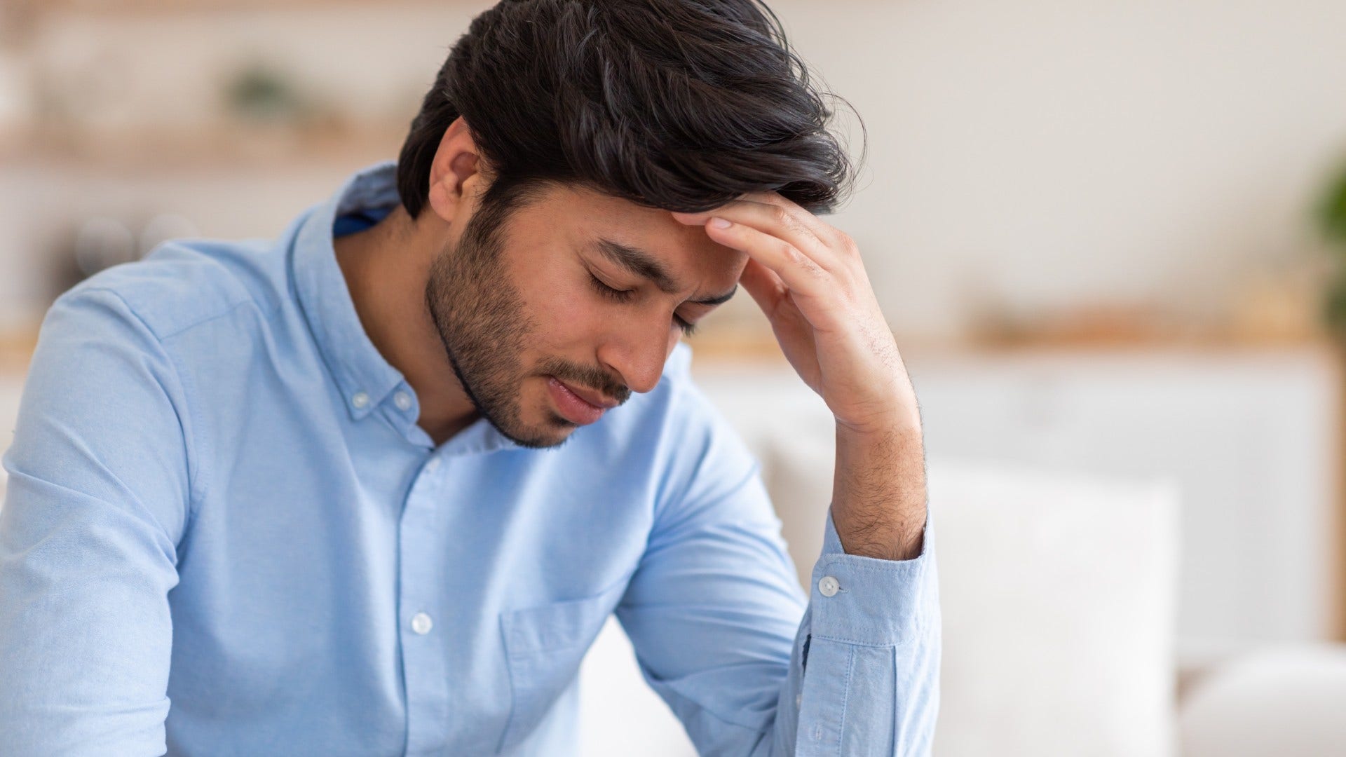 man who doesn't want to hear other's bad news carrying more than he reveals