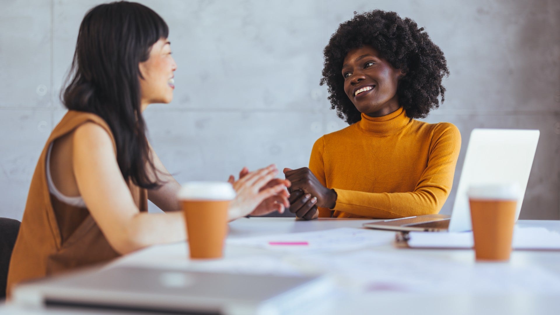 woman who doesn't want to hear others bad news having a solution-oriented conversation