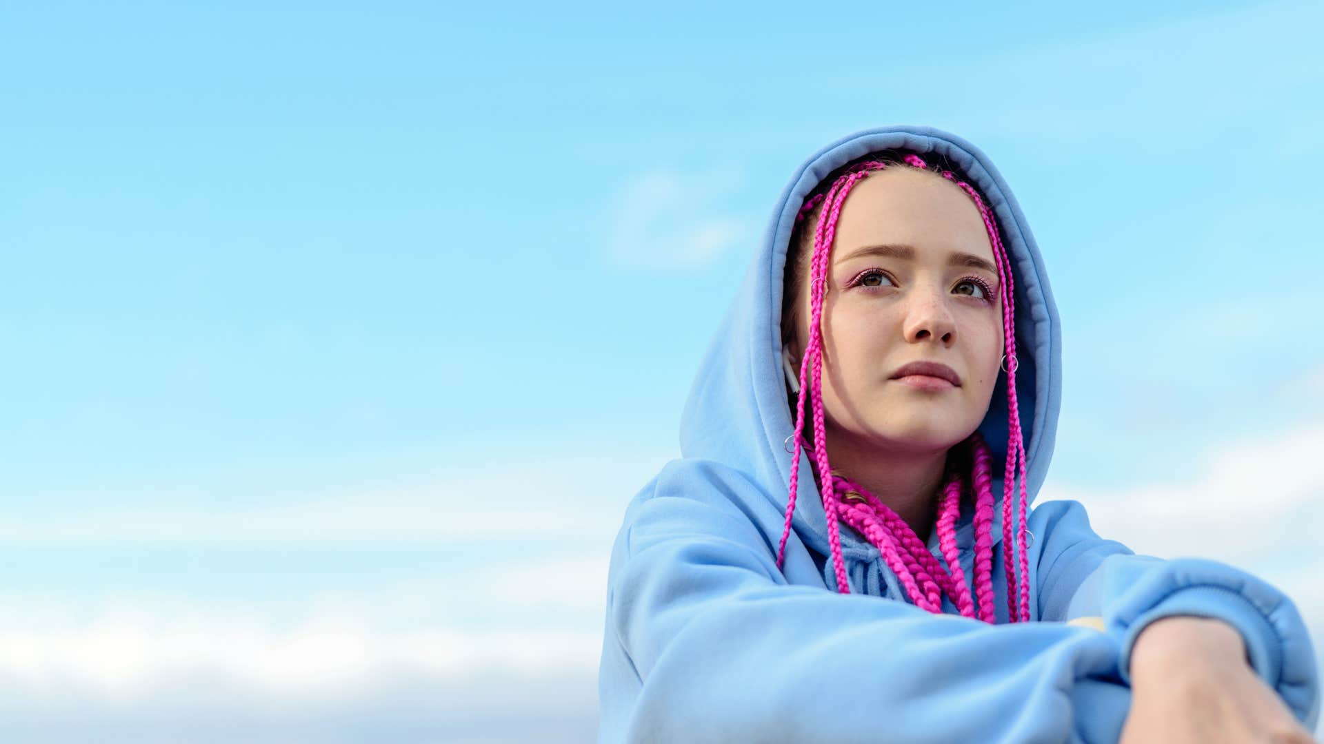 Self aware person sits calmly showing thing to do earlier in life