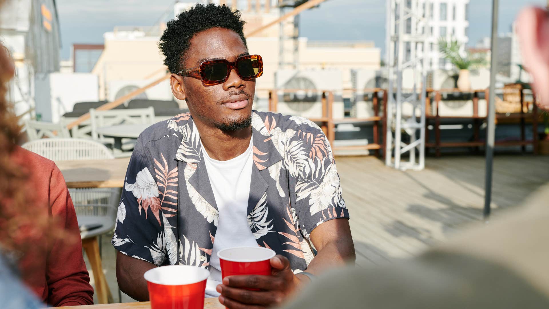 Relaxed person spends time with friends showing self awareness