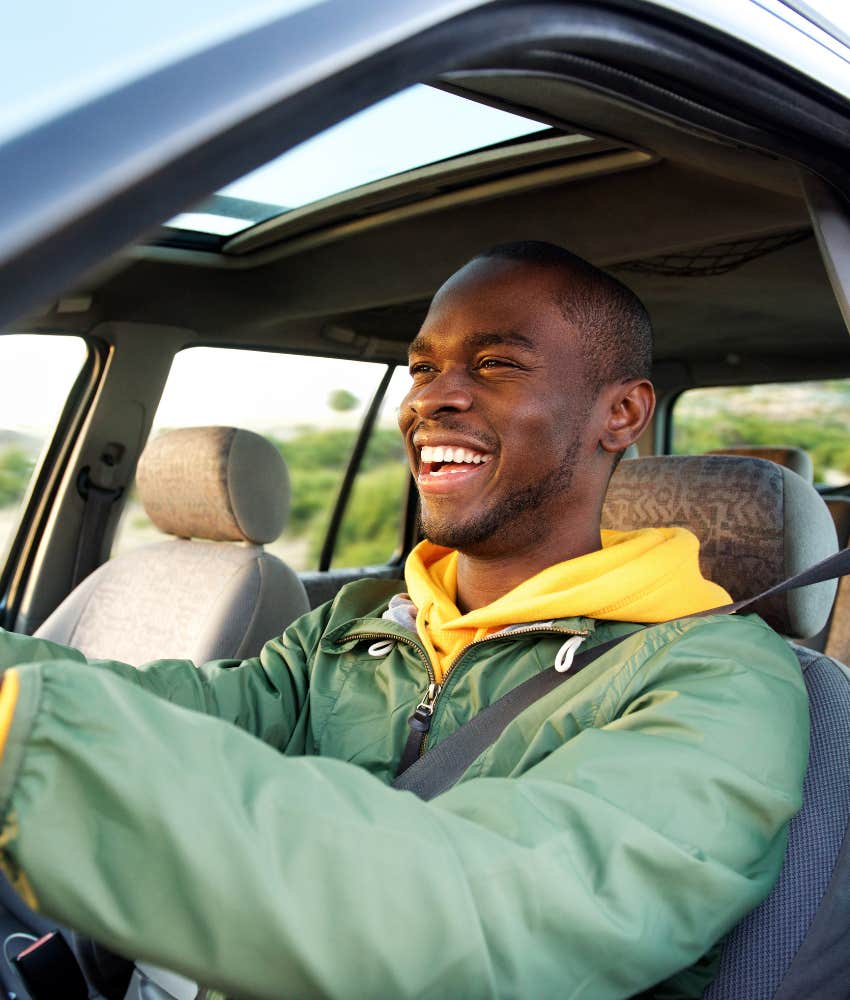 Happy traveler on impulsive road trip