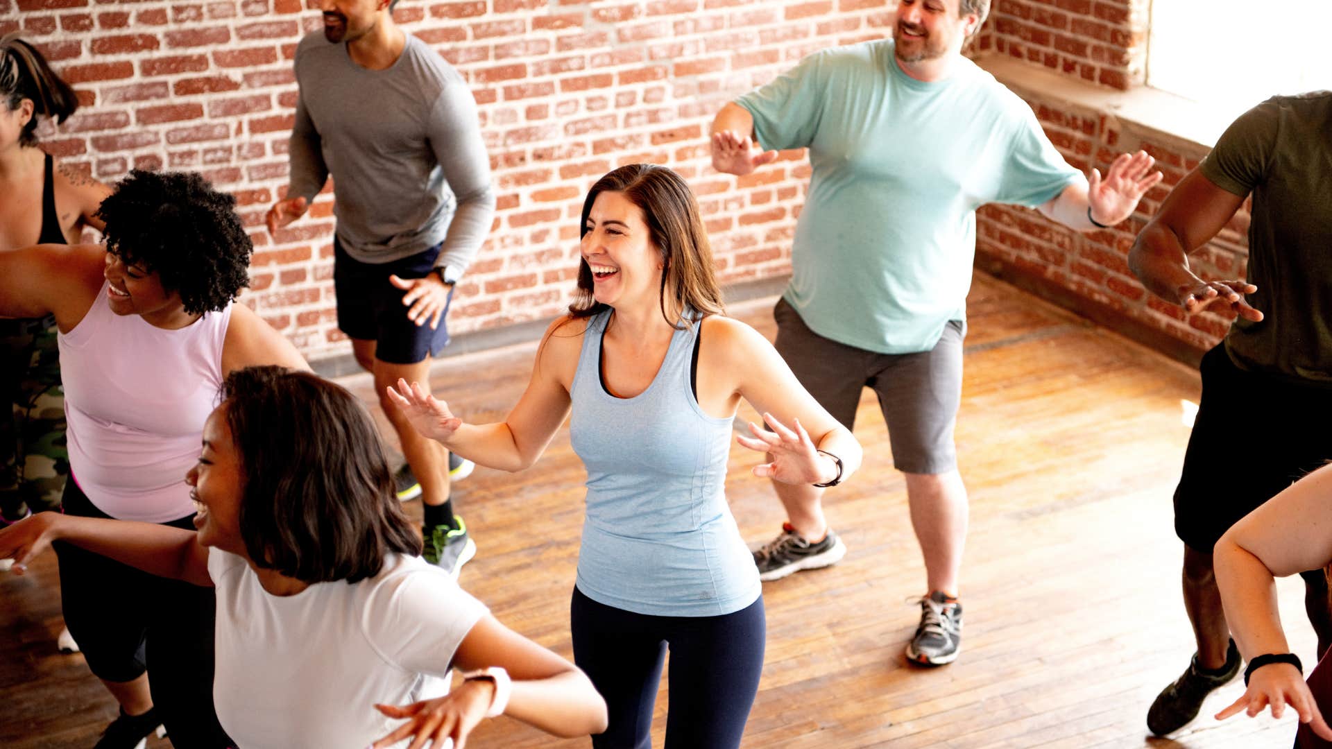 Enthusiastic group exercises showing habit after divorce
