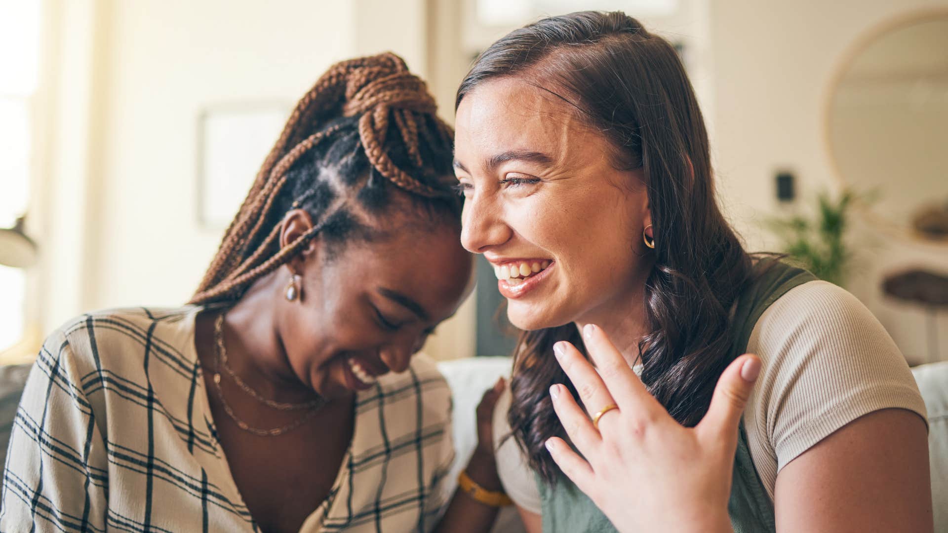 friends laugh together showing importance of fun after divorce