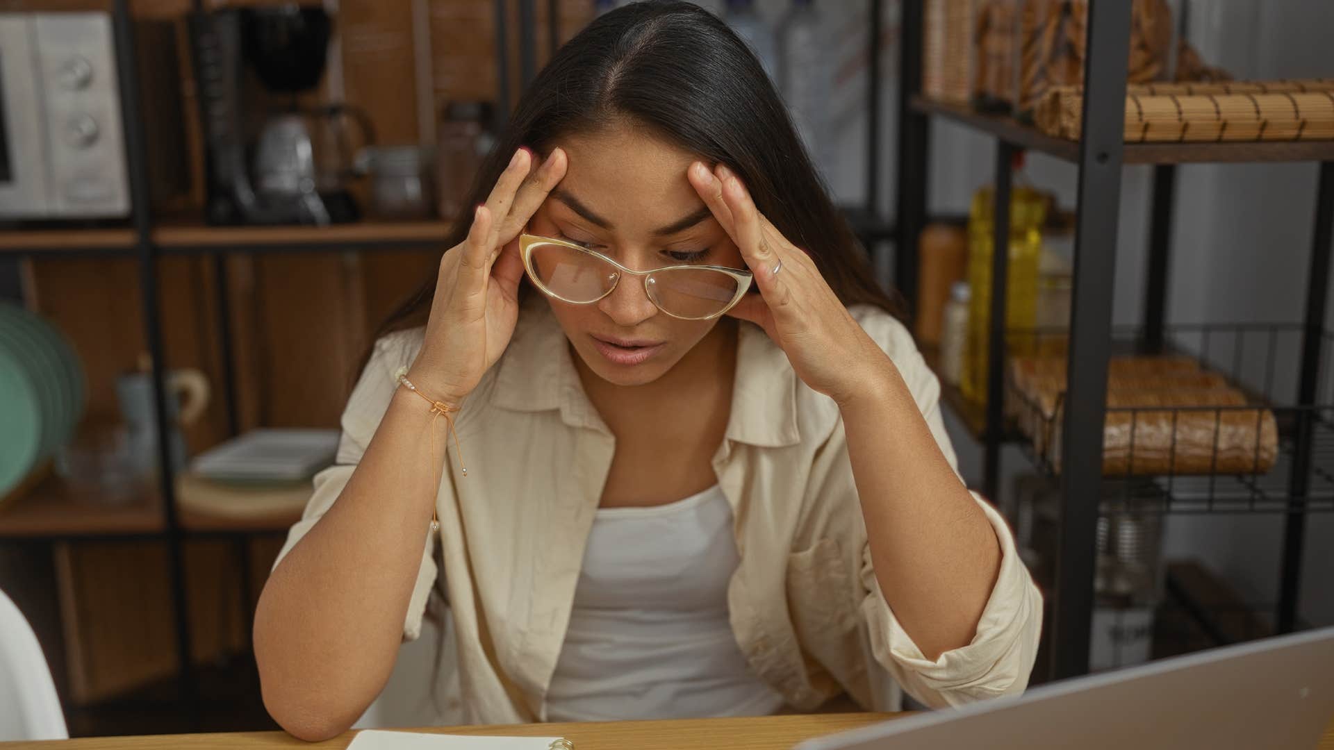 Neurotic woman looking stressed at home.