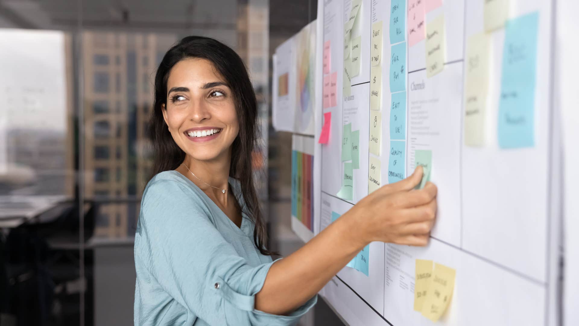 highly efficient woman making plans at work