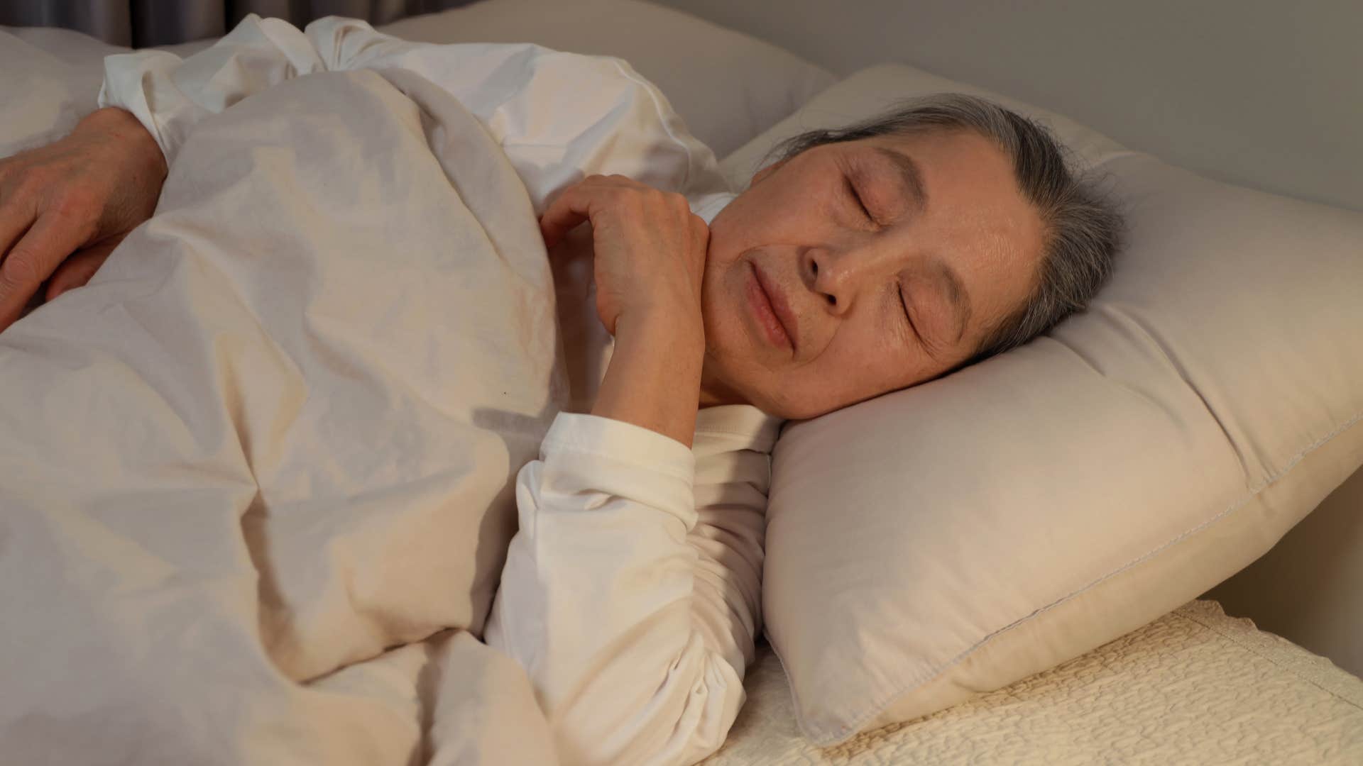 Committed woman lying in her bed.