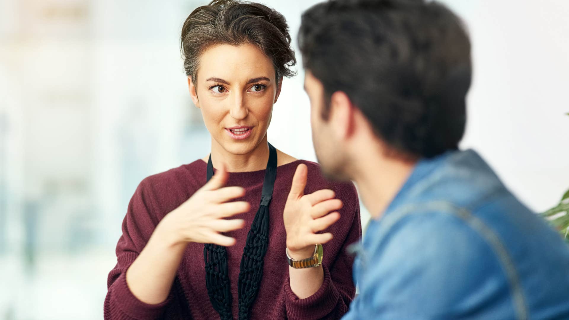 woman who's not competitive talking to a co-worker