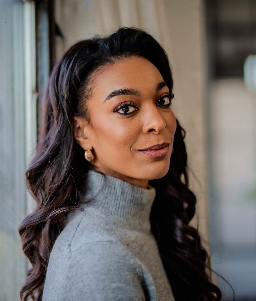 Kind person in sweater showing accepting personality