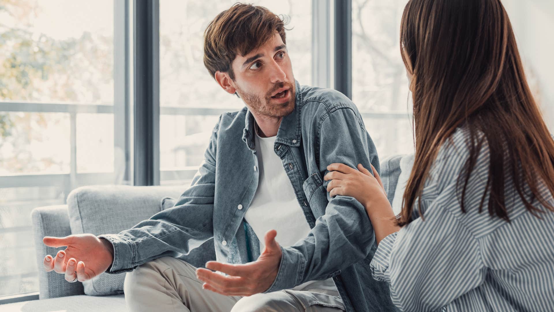 Man saying "I can't stop replaying that conversation" to his partner.