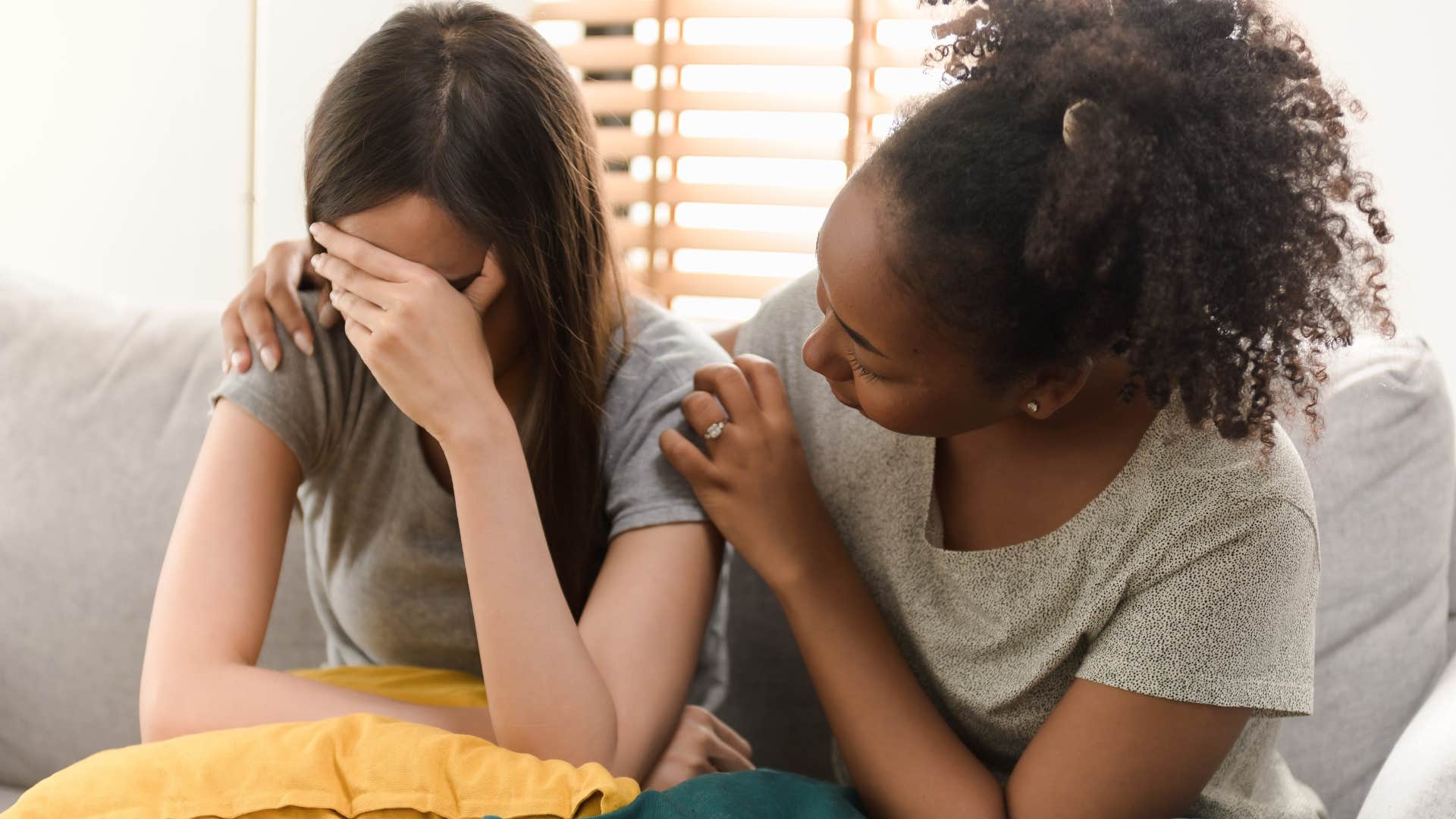 Woman saying "Maybe I'm just reading into it too much" to her upset friend.