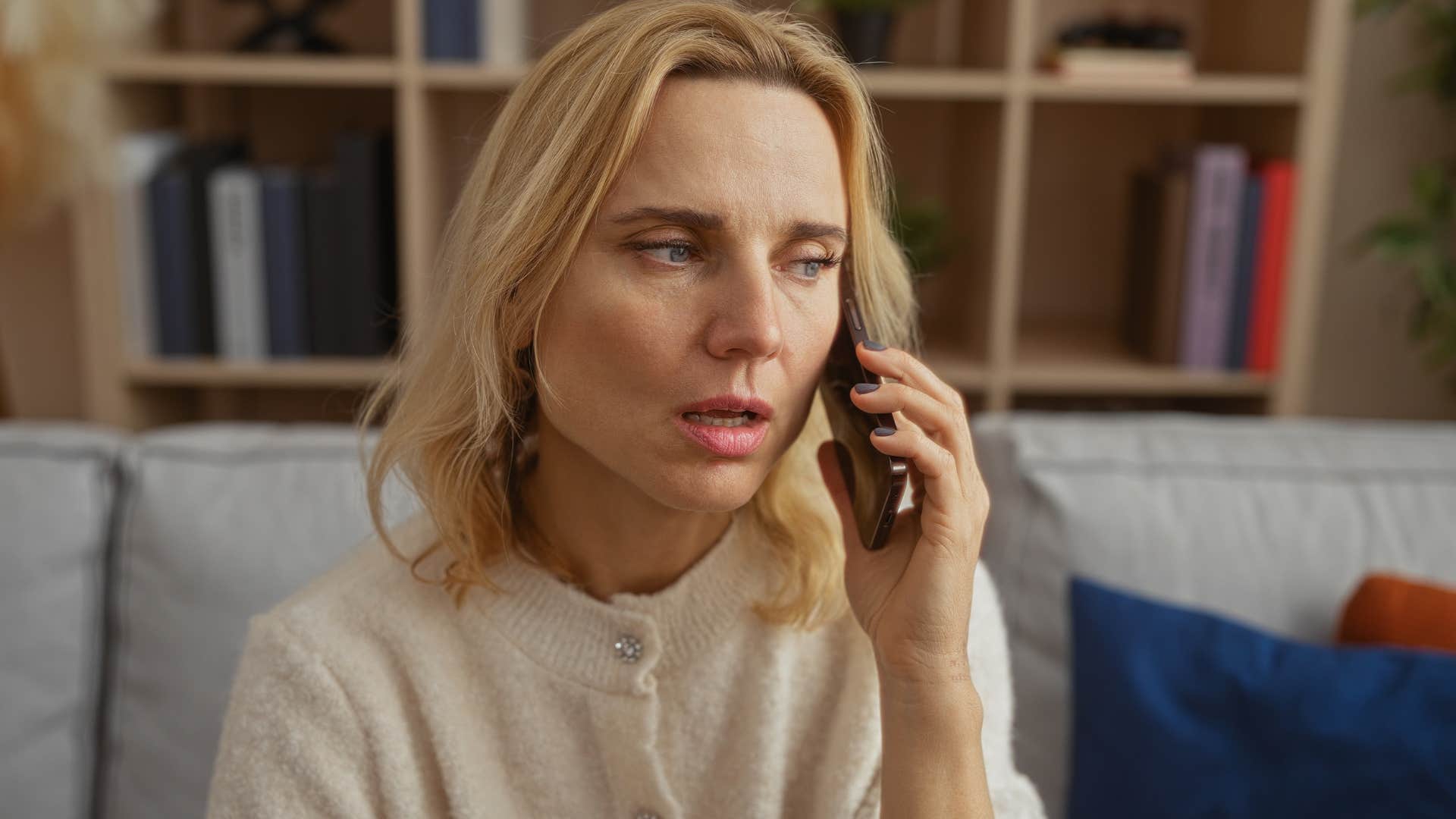 woman who's often misunderstood talking on the phone