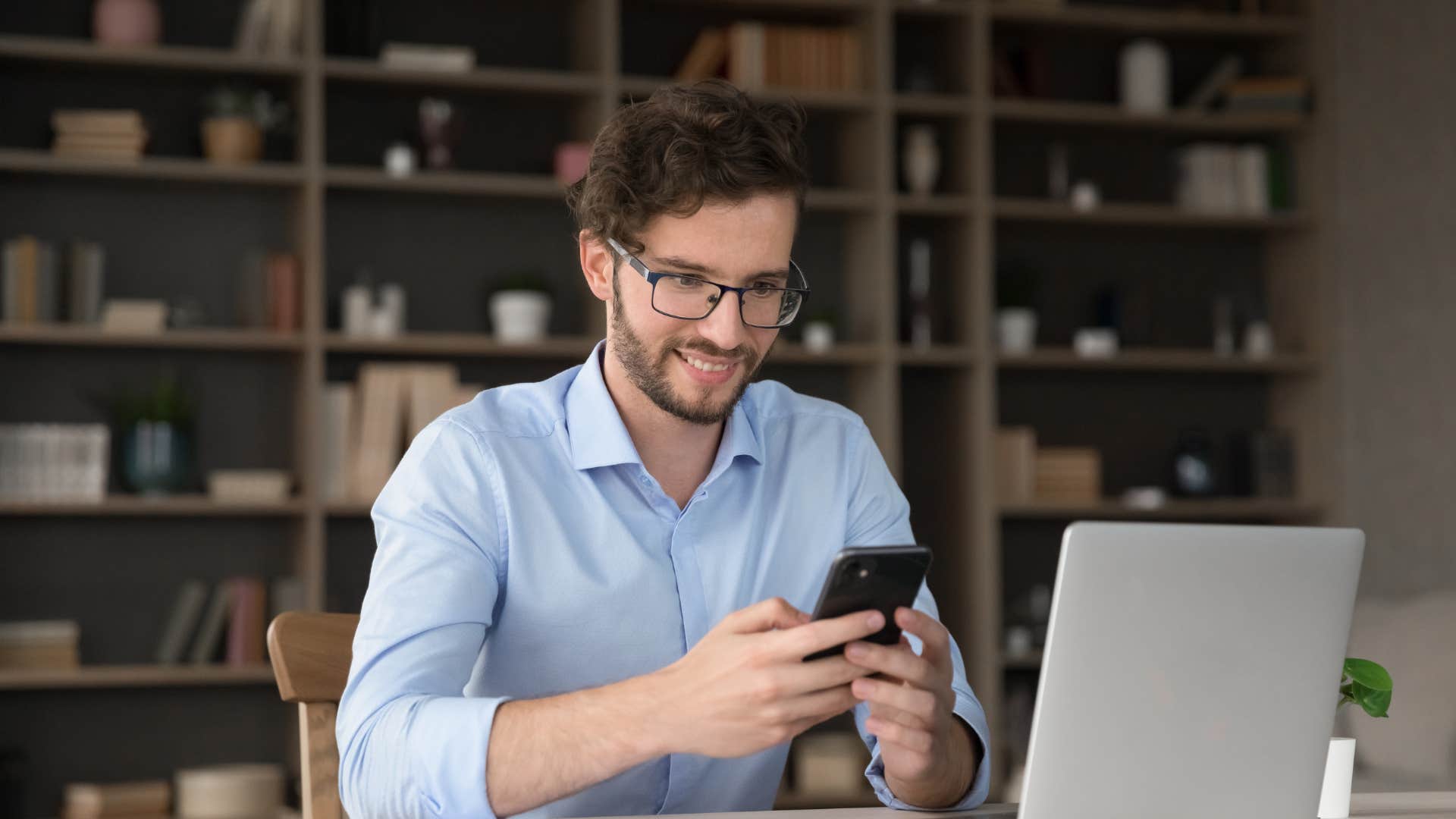 man who is a master of multitasking who puts the TV on just for background noise