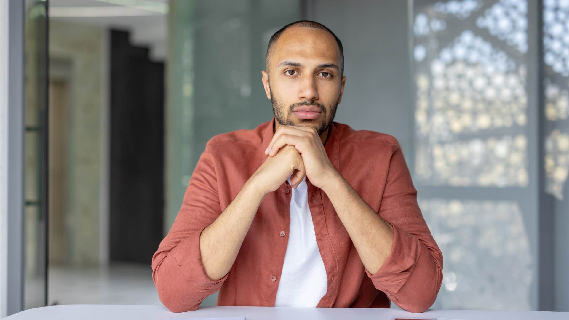 man sitting at desk