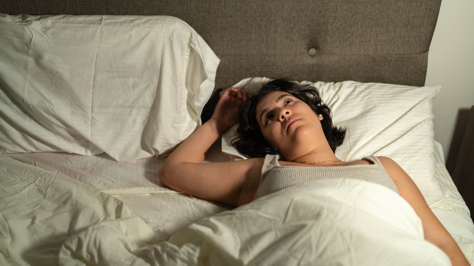 perfectionist woman who replays conversations in her head at night