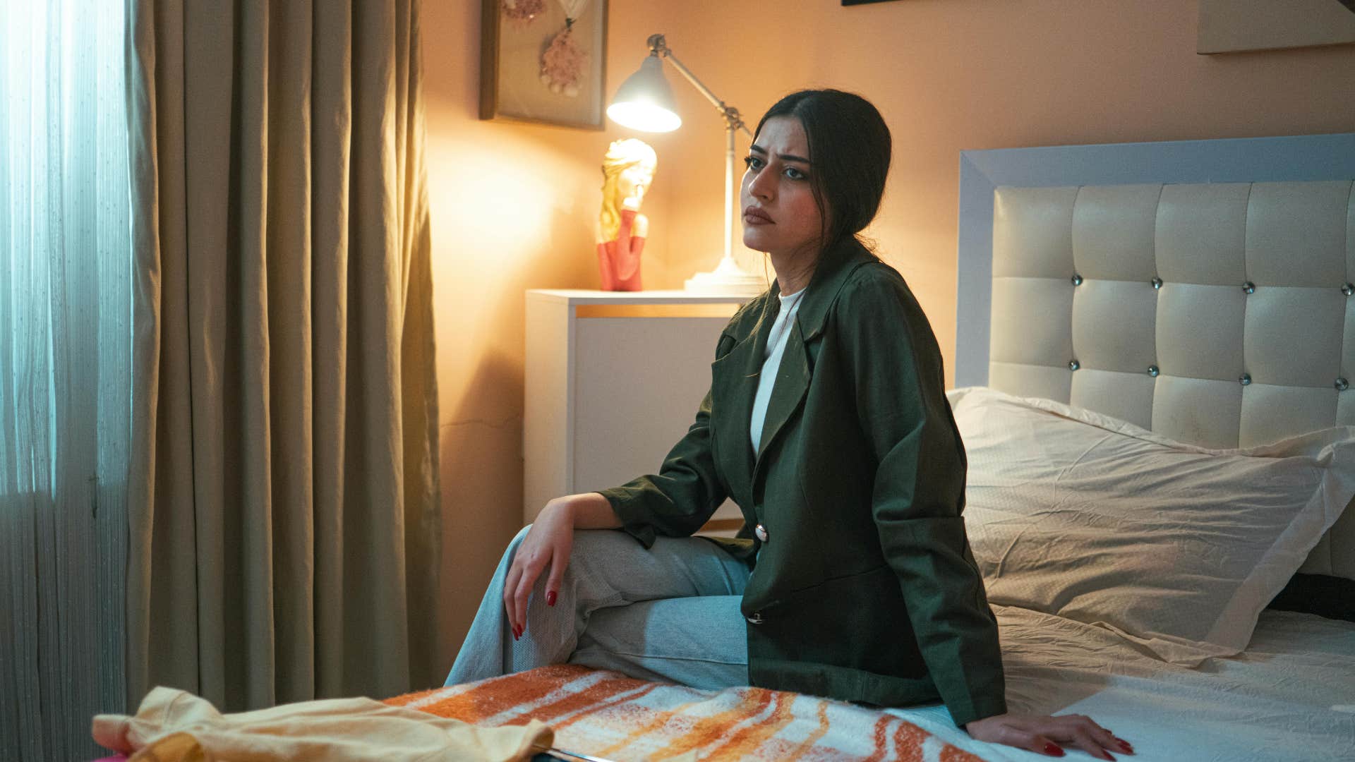 reflective woman who replays conversations in her head at night