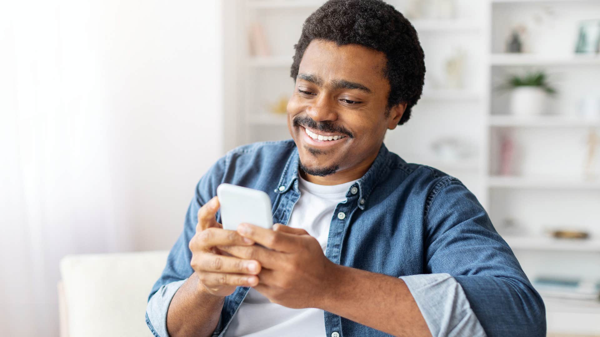 prosocial man taking a screenshot he'll never look at again