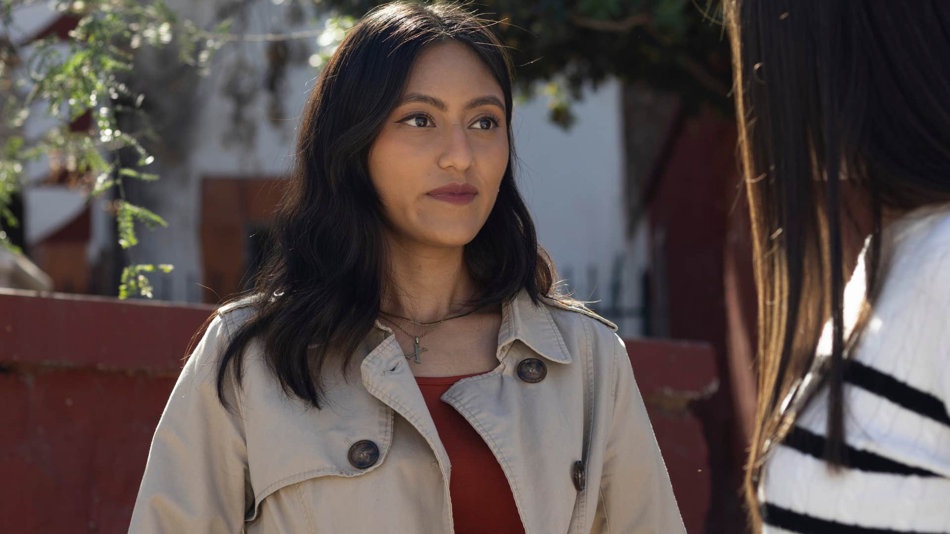 Woman saying "must be nice" to her friend.